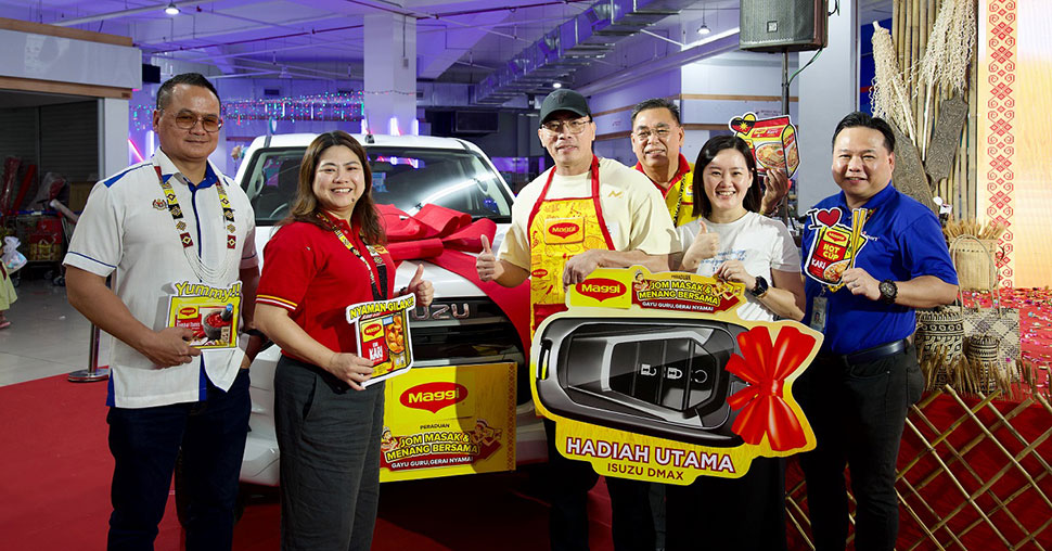 receiving the grand prize - a brand-new ISUZU D-MAX