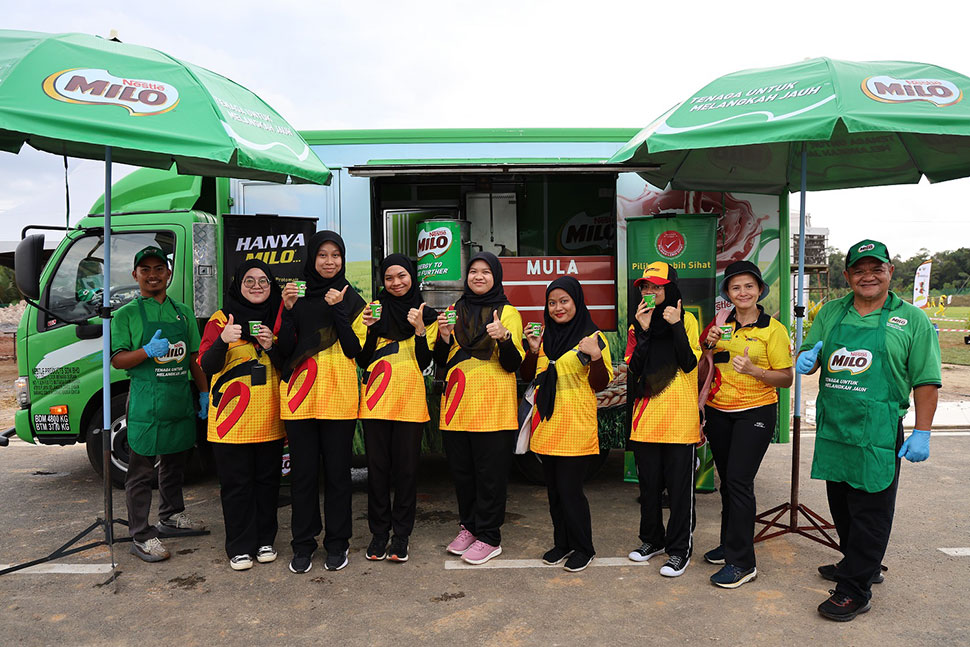 Sarawak's female cricket team enjoys a cup of MILO® to energise themselves