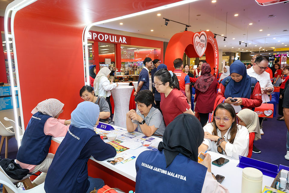 Visitors participate in free health screenings conducted by Yayasan Jantung Malaysia