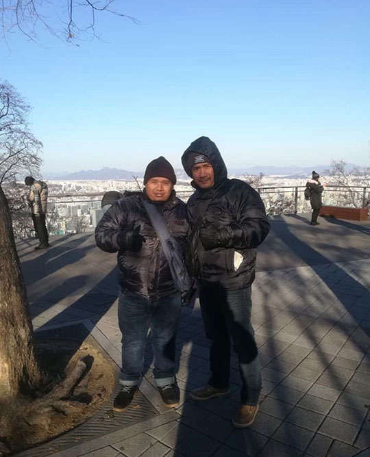Junaidi and Jefridin spending their time together as father and son traveling.