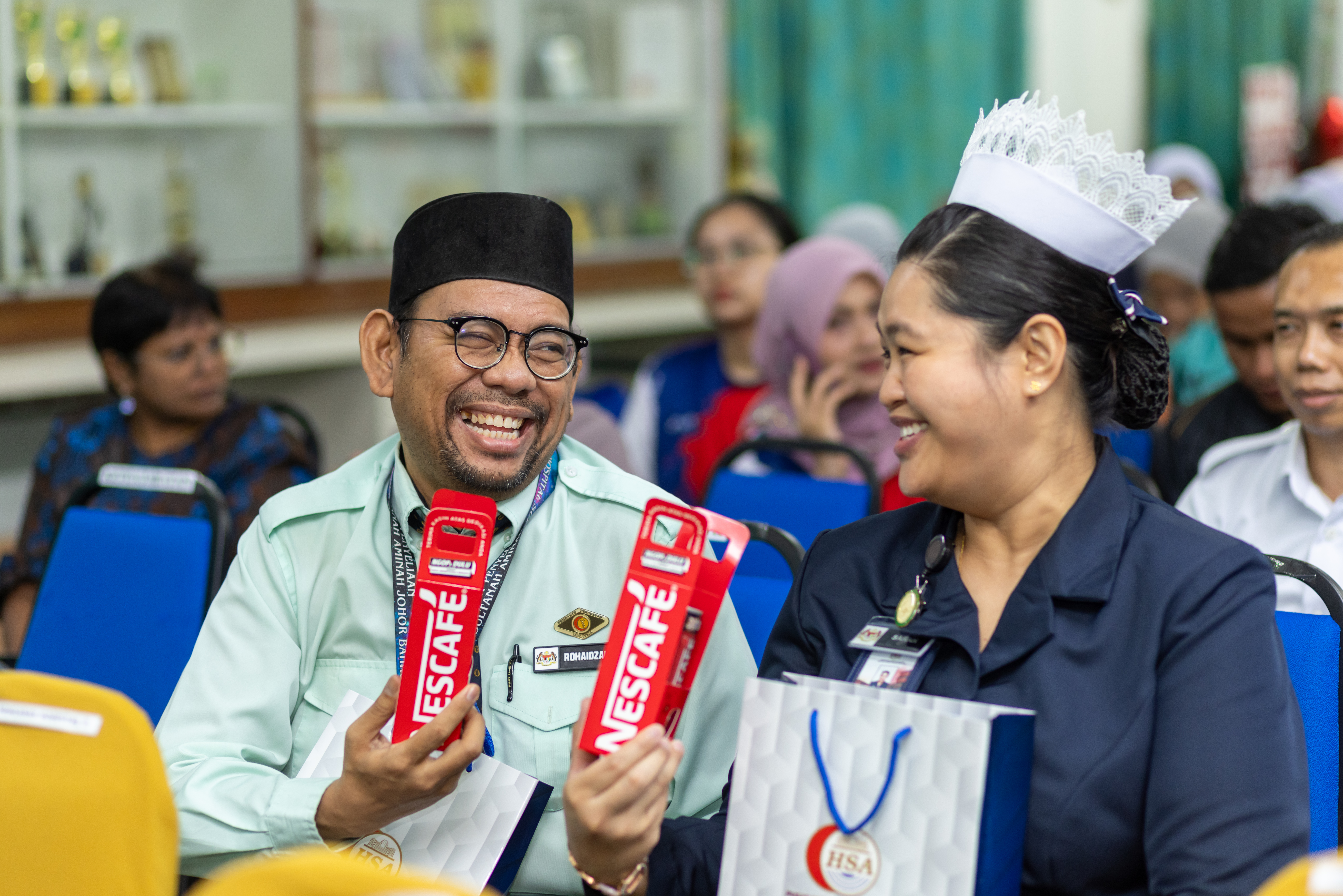 Staff at Hospital Sultanah Aminah taking a moment to connect, laugh and recharge together with NESCAFÉ.