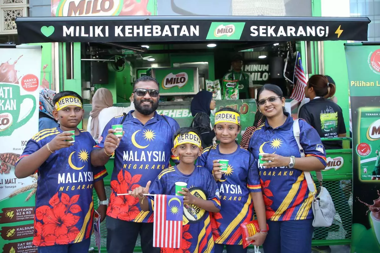 A family joins the Merdeka celebrations at the MILO® truck
