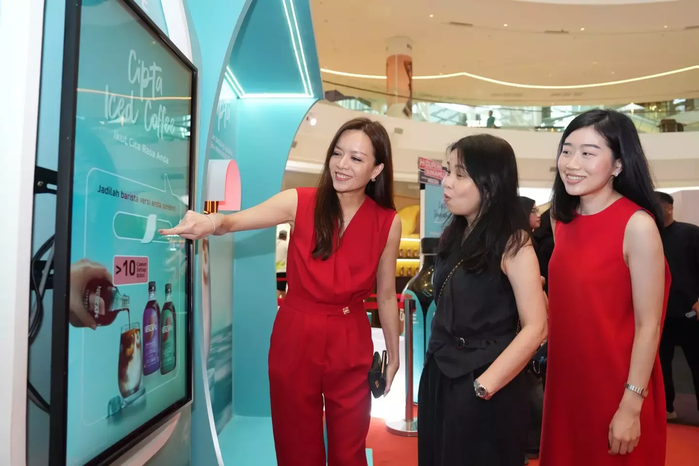 Visitors discovering more about NESCAFÉ through interactive activities